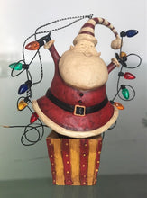 "Santa's Surprise" Ornament by Dan DiPaolo