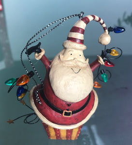 "Santa's Surprise" Ornament by Dan DiPaolo