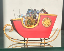 "Santa's Sleigh" filled with wrapped gifts by Lori Mitchell
