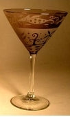 One etched Martini Glasses by Leandra Drumm