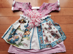 Toni Tierney Dress with Apron, pom-poms and flower/ 3 mo. & 12 mo.